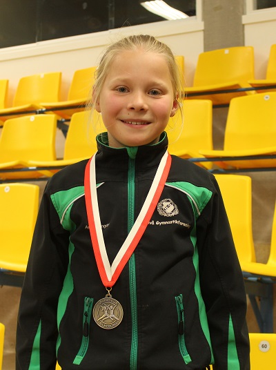 Astrid med bronzemedaljen
